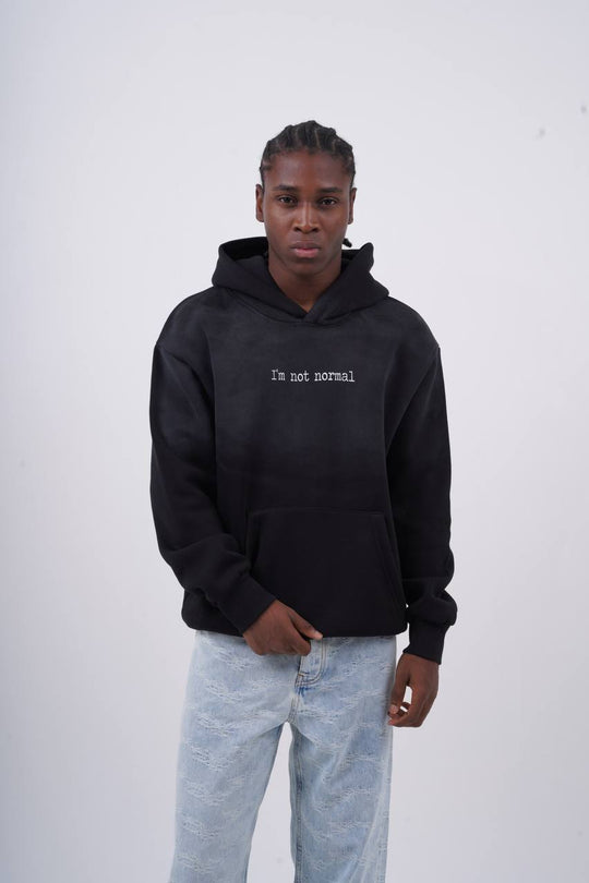 "I'm Not Normal" Graphic Hoodie